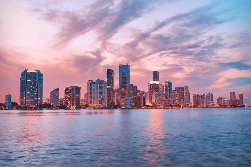 The Miami skyline at sunset across Biscayne Bay